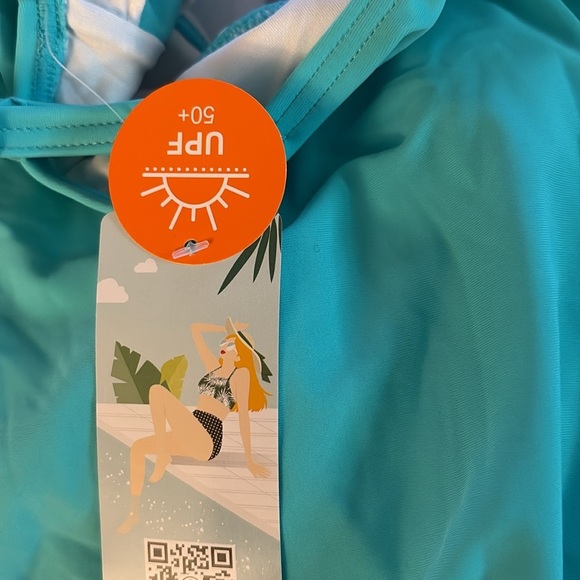 Elegant tummy control 
Ruched Stunning Turquoise Ruffle 
One-Piece Swimsuit - Picture 8 of 8